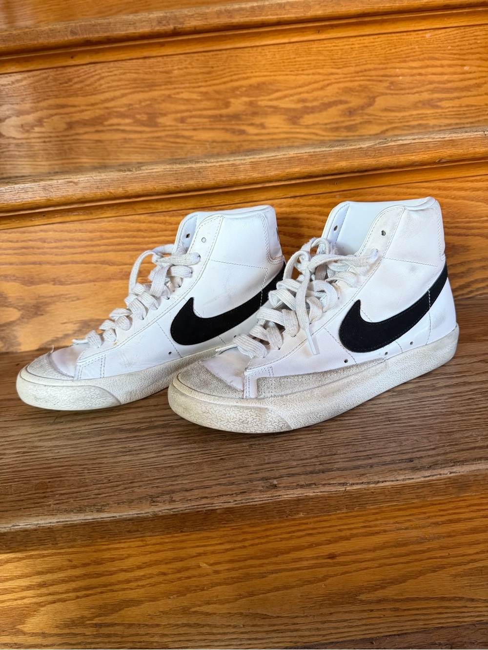 Nike Men’s White High-Top Sneakers with Black Swoosh Accents